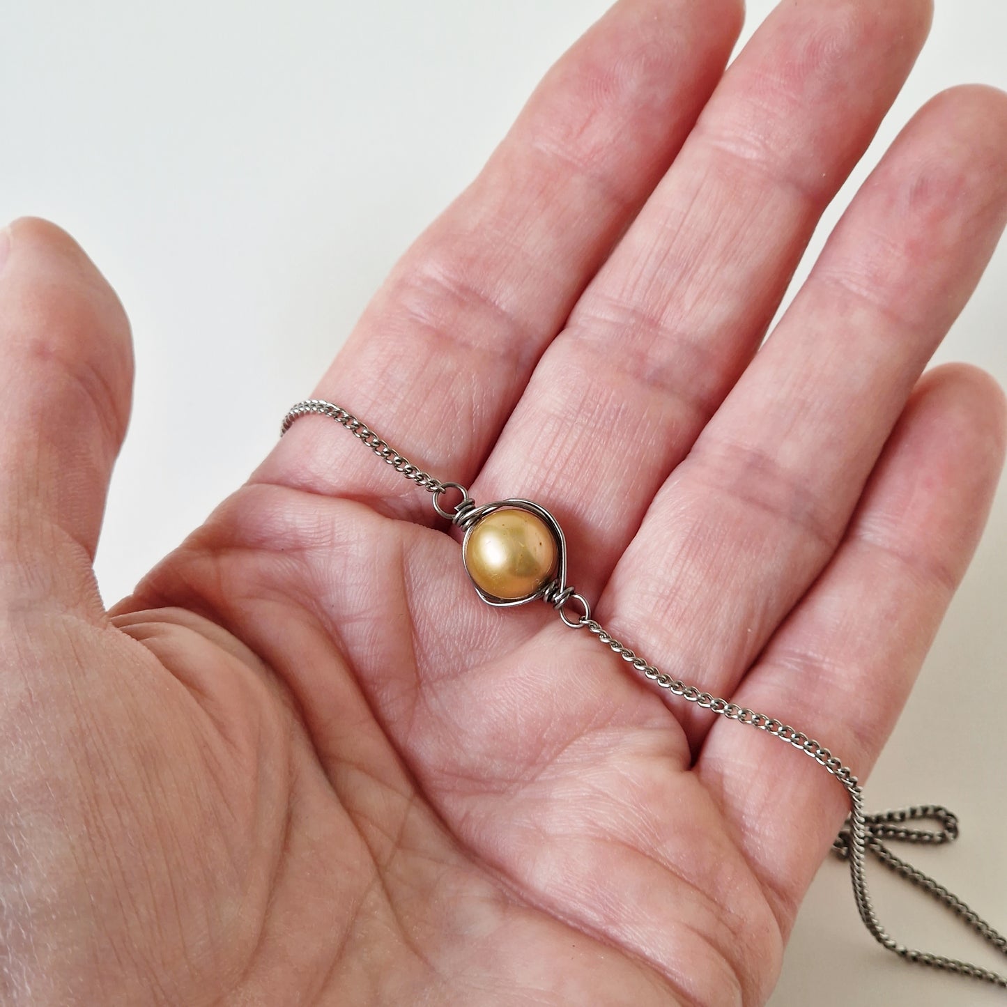 Titanium Necklace with Wrapped Champagne Pearl