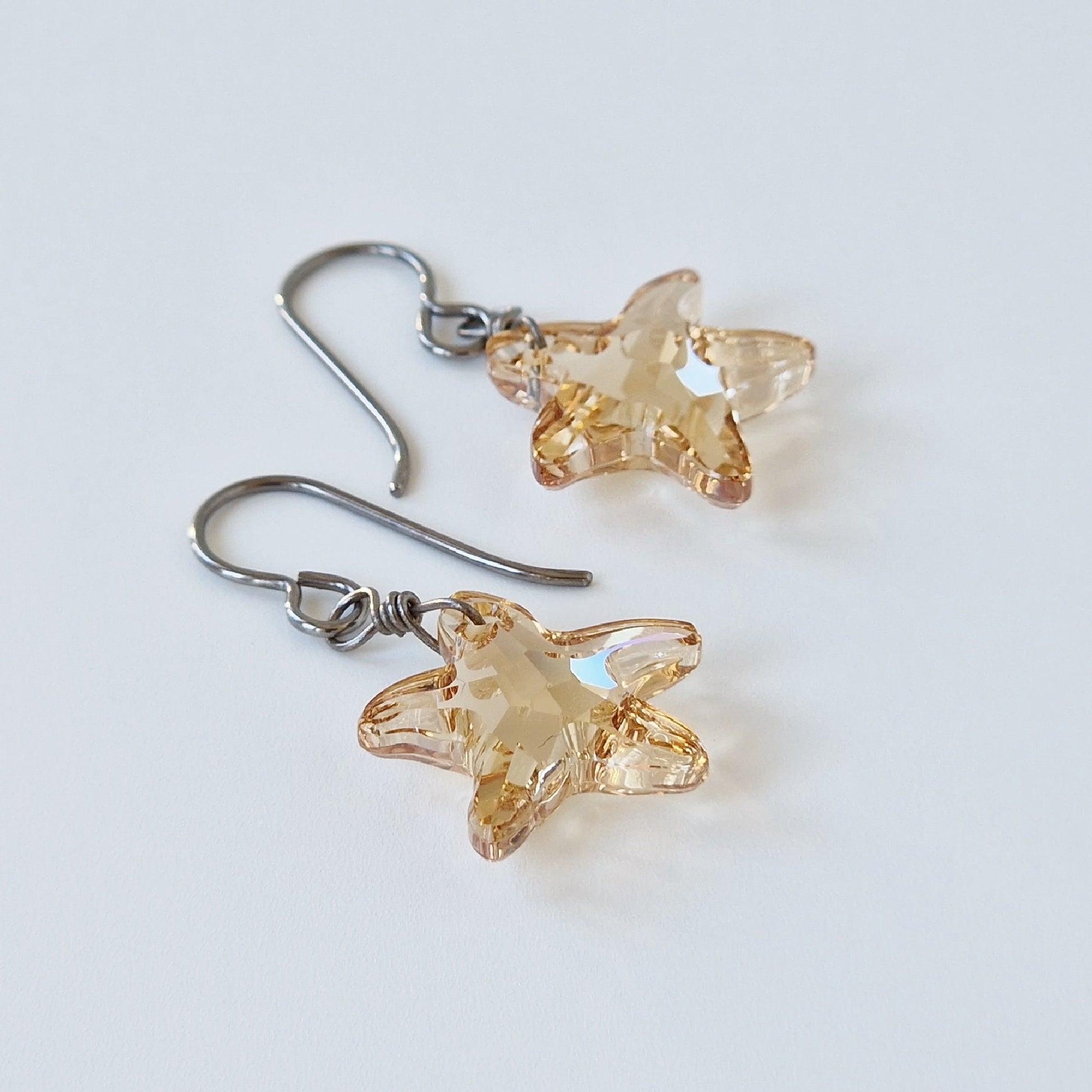 Golden Shadow Crystal Starfish Titanium Earrings