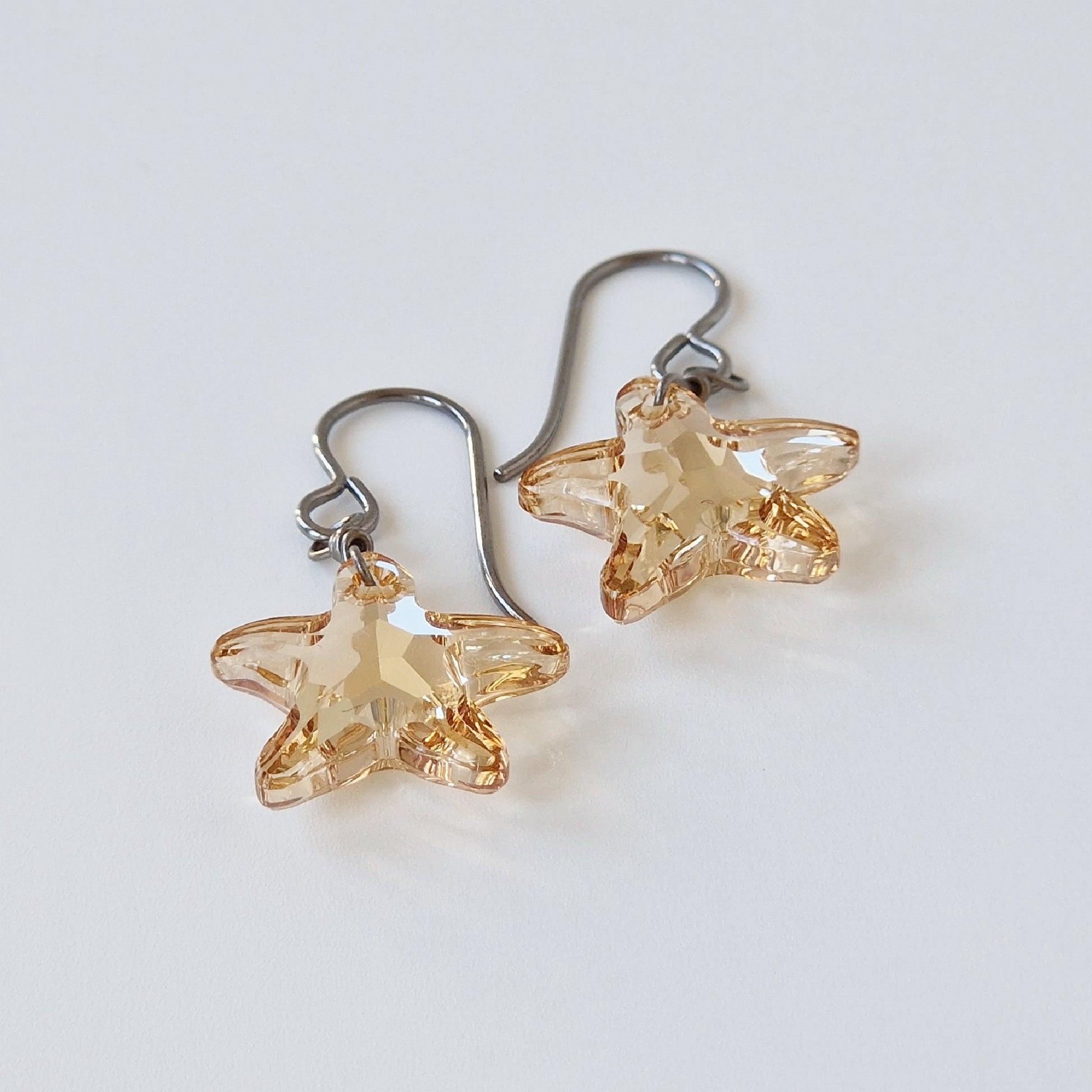 Golden Shadow Crystal Starfish Titanium Earrings