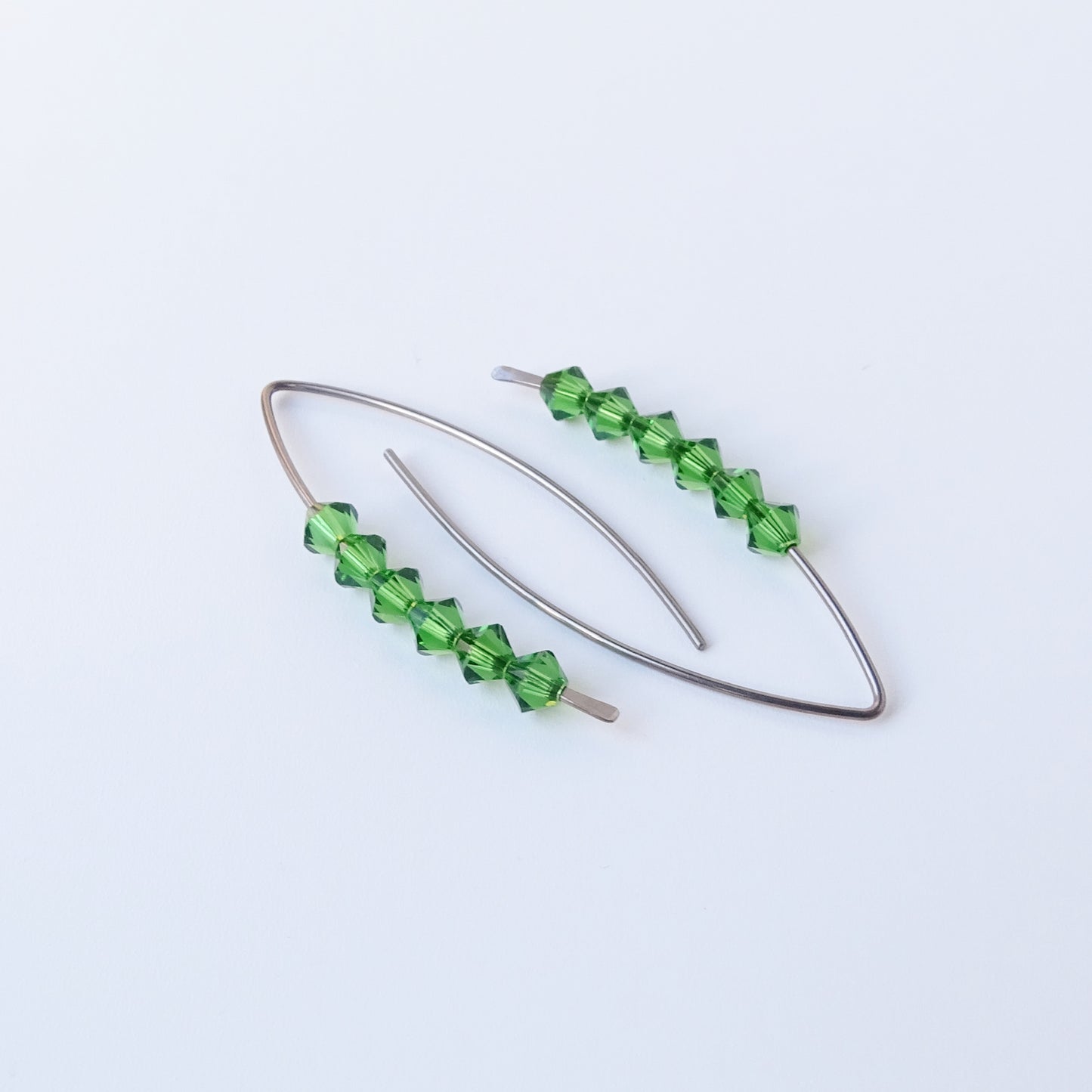 Niobium Earrings with Fern Green Crystals