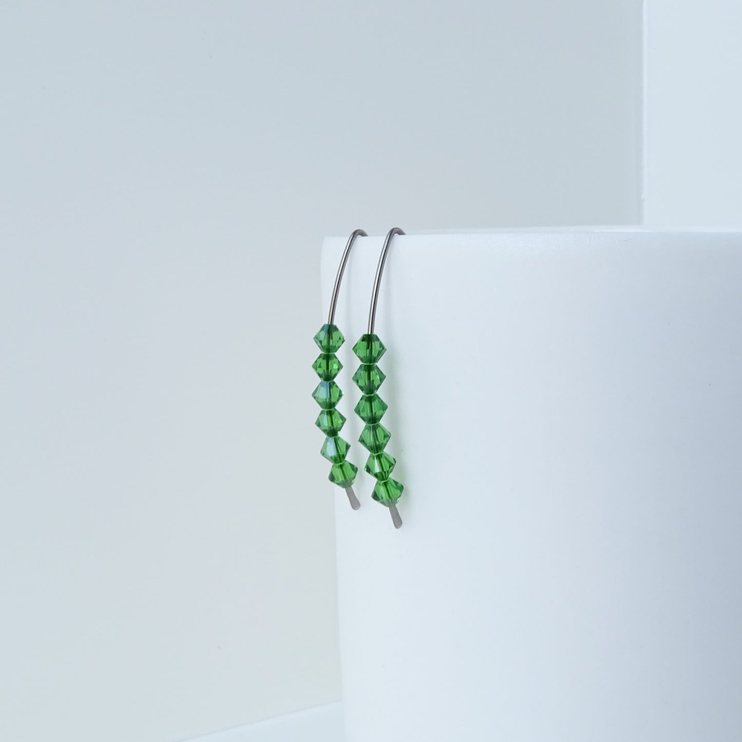 Niobium Earrings with Fern Green Crystals