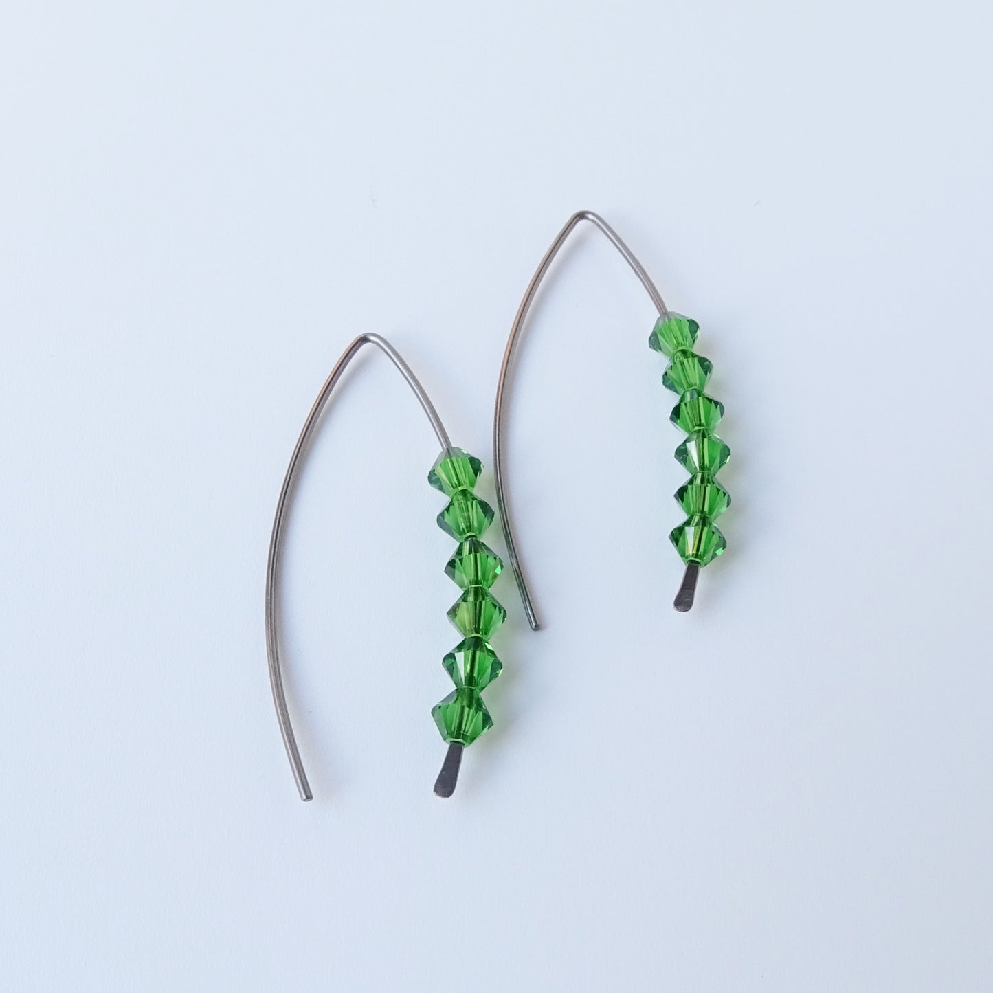 Niobium Earrings with Fern Green Crystals