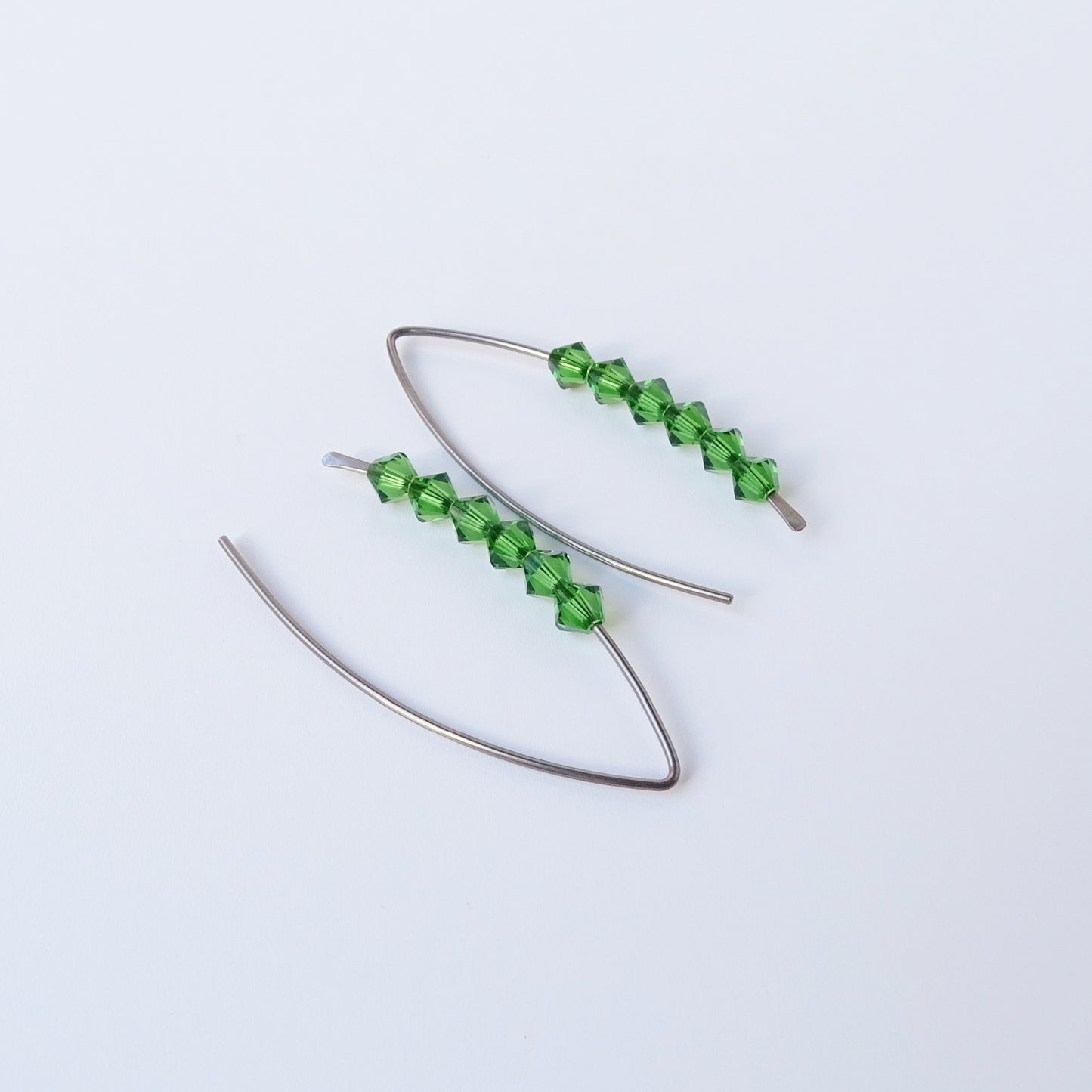 Niobium Earrings with Fern Green Crystals