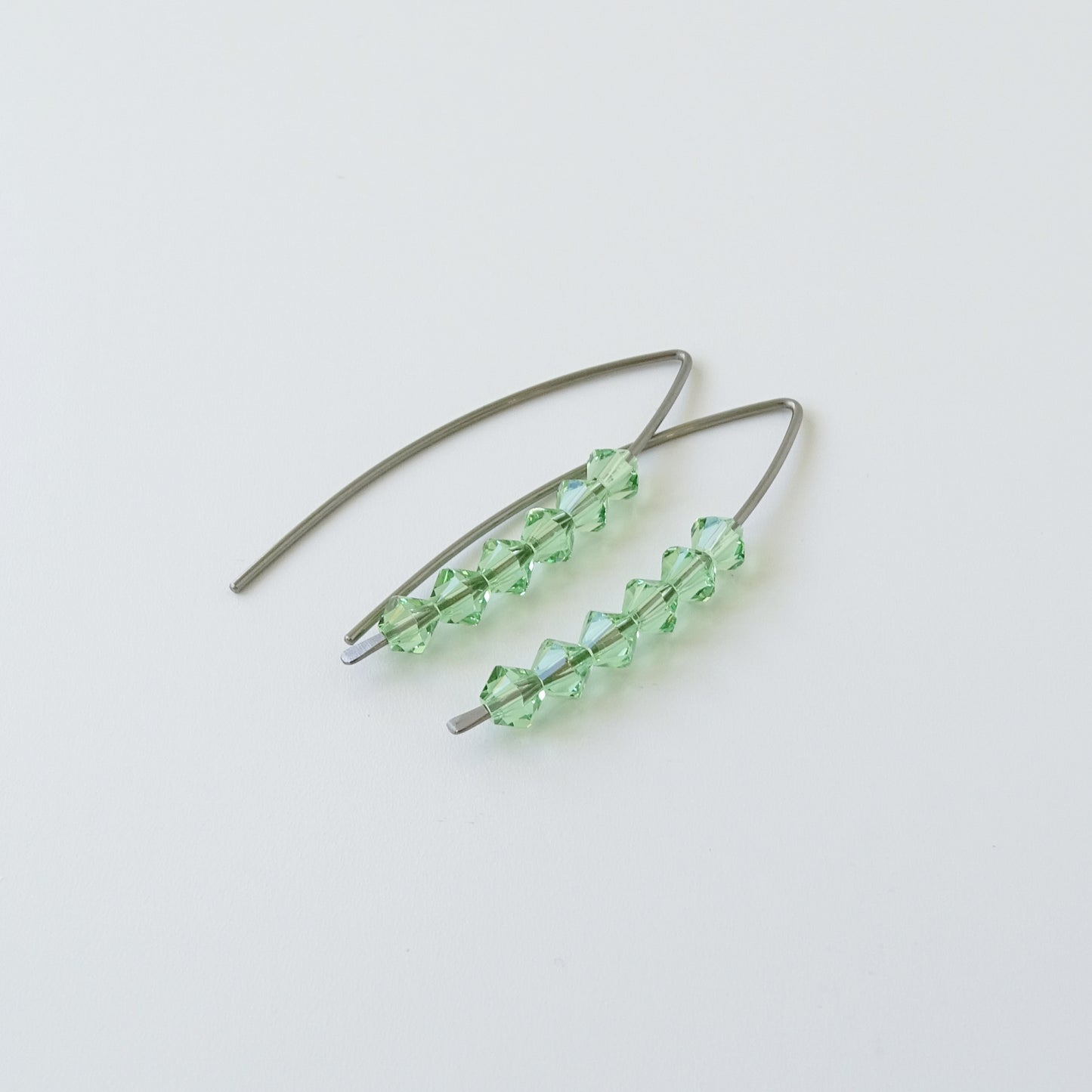 Niobium Earrings with Peridot Crystals