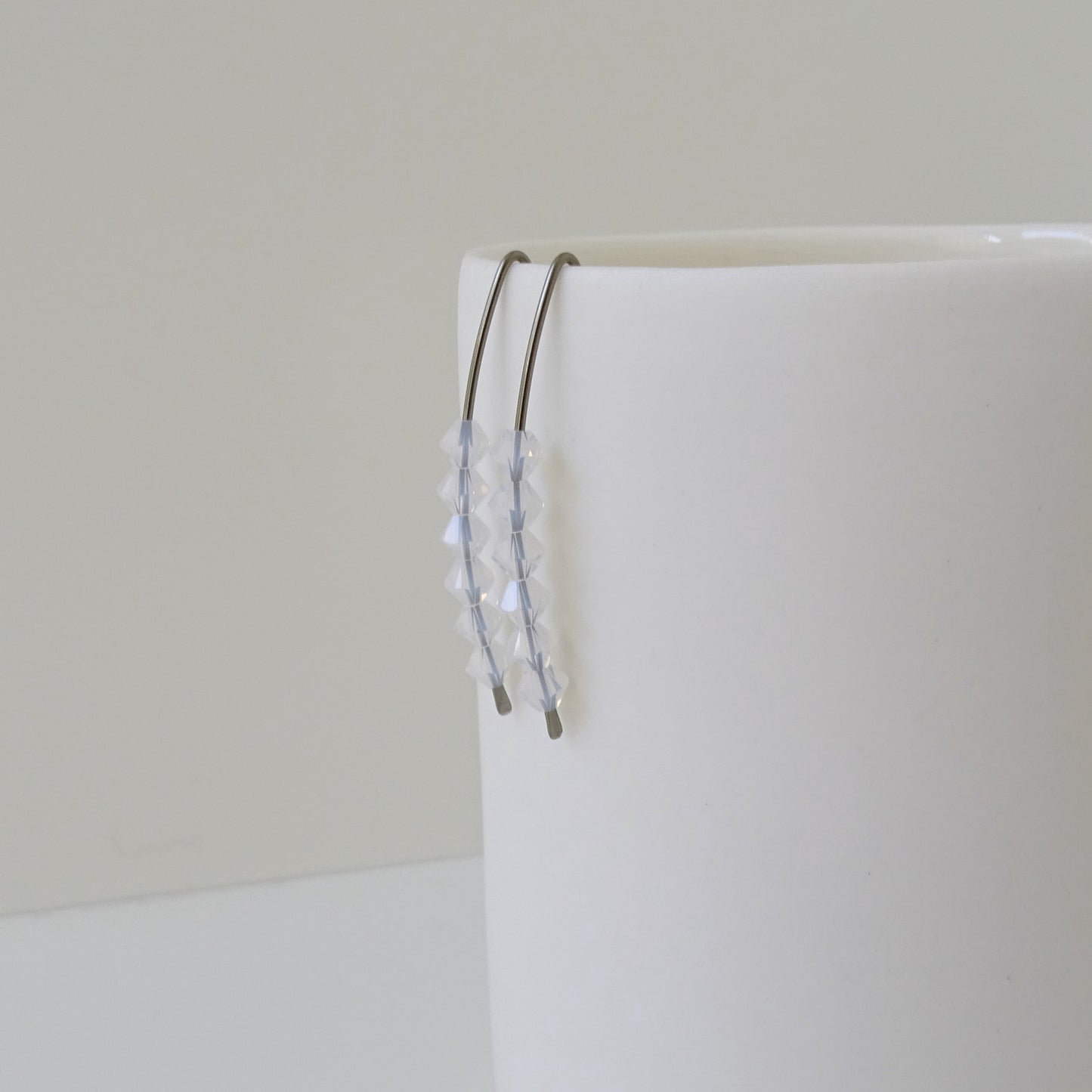 Niobium Earrings with White Opal Crystals