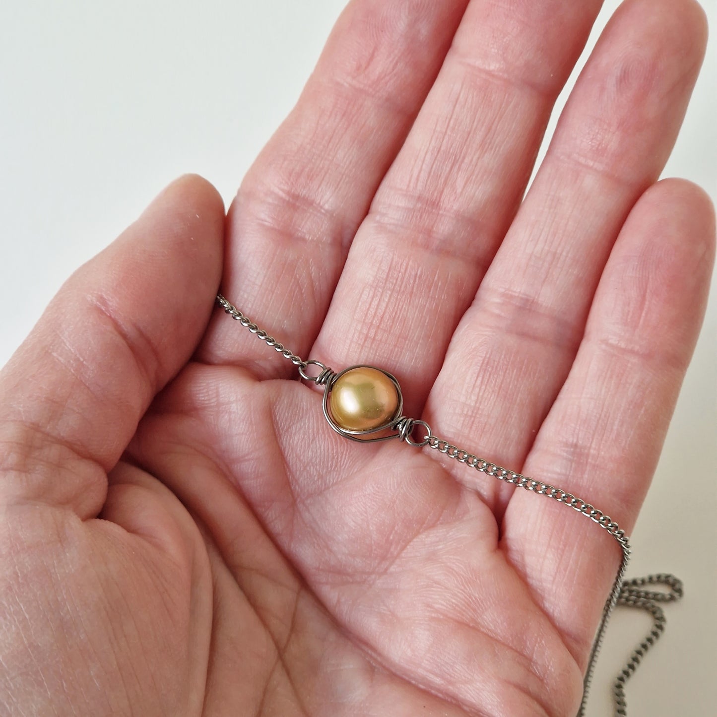 Titanium Necklace with Wrapped Champagne Pearl