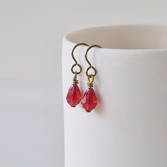 Gold Titanium Earrings with Ruby Red Crystal Teardrops