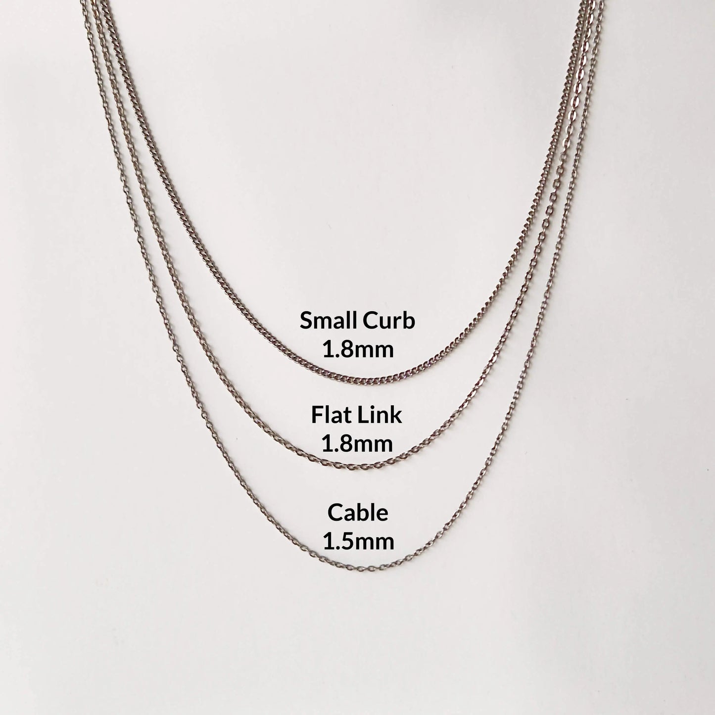 Three different Titanium chain style necklaces to choose from, each labeled with the corresponding necklace width in millimeters: Small Curb (1.8mm), Flat Link (1.8mm), and Cable (1.5mm).