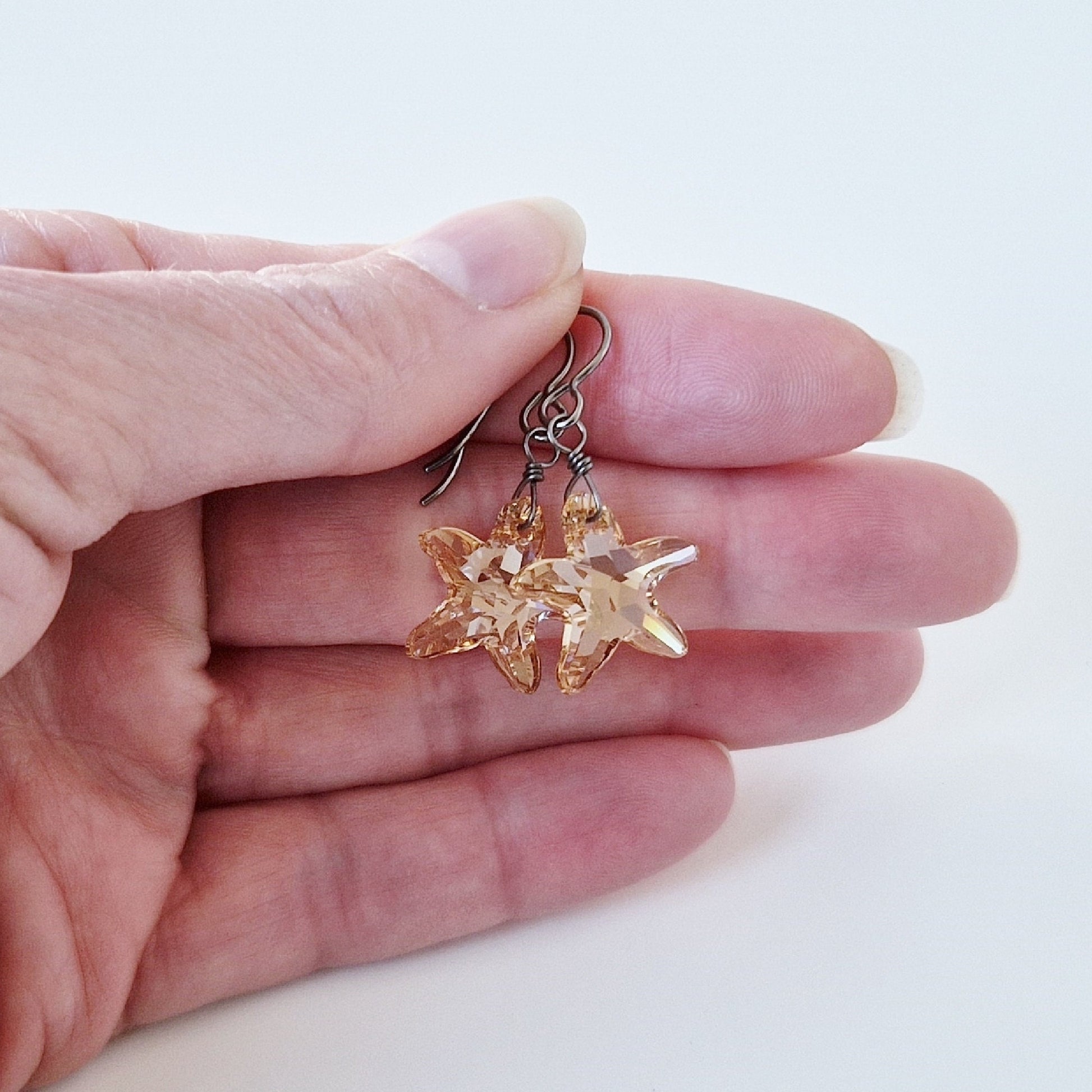 Golden Shadow Crystal Starfish Titanium Earrings
