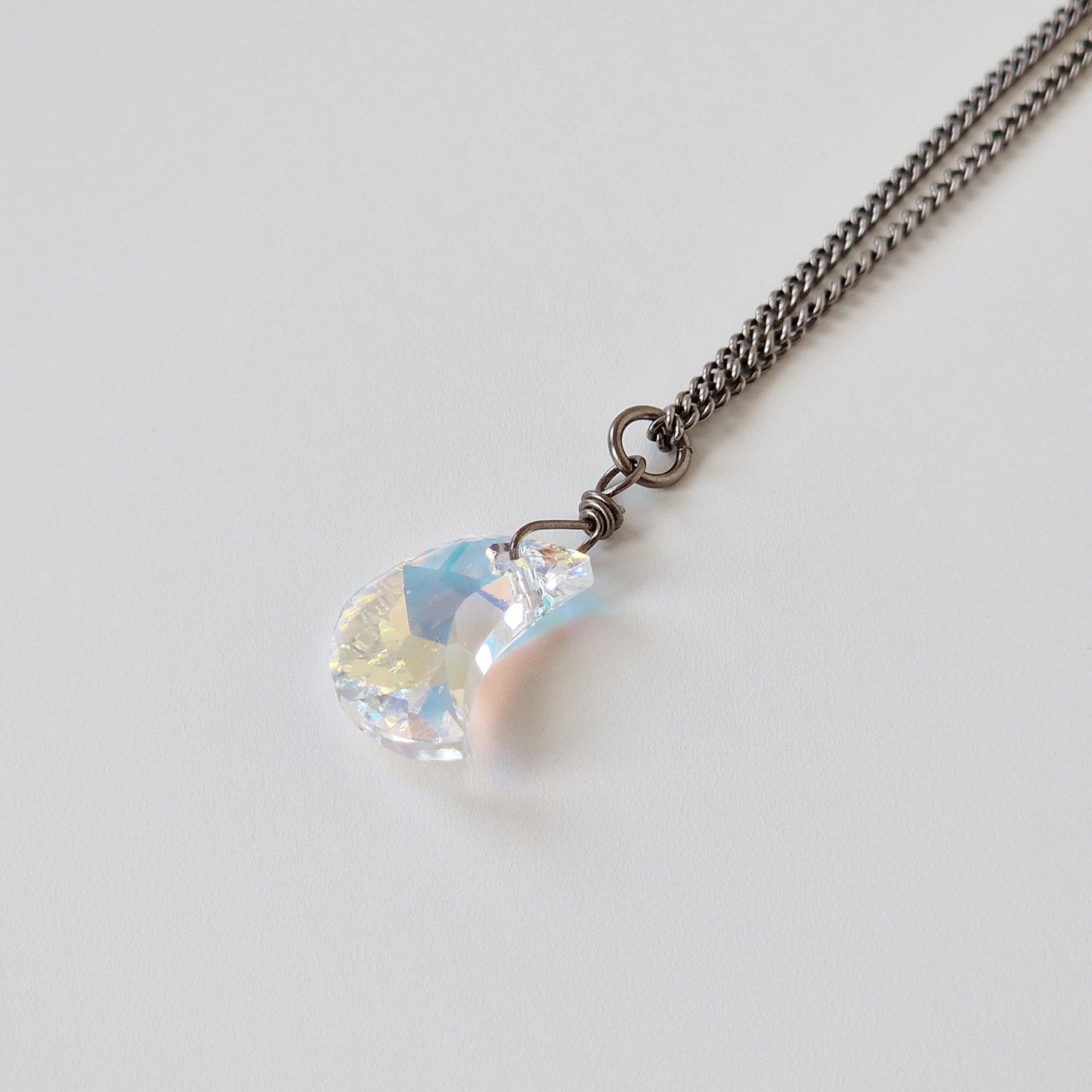Small Aurora Borealis Moon Crystal Titanium Necklace