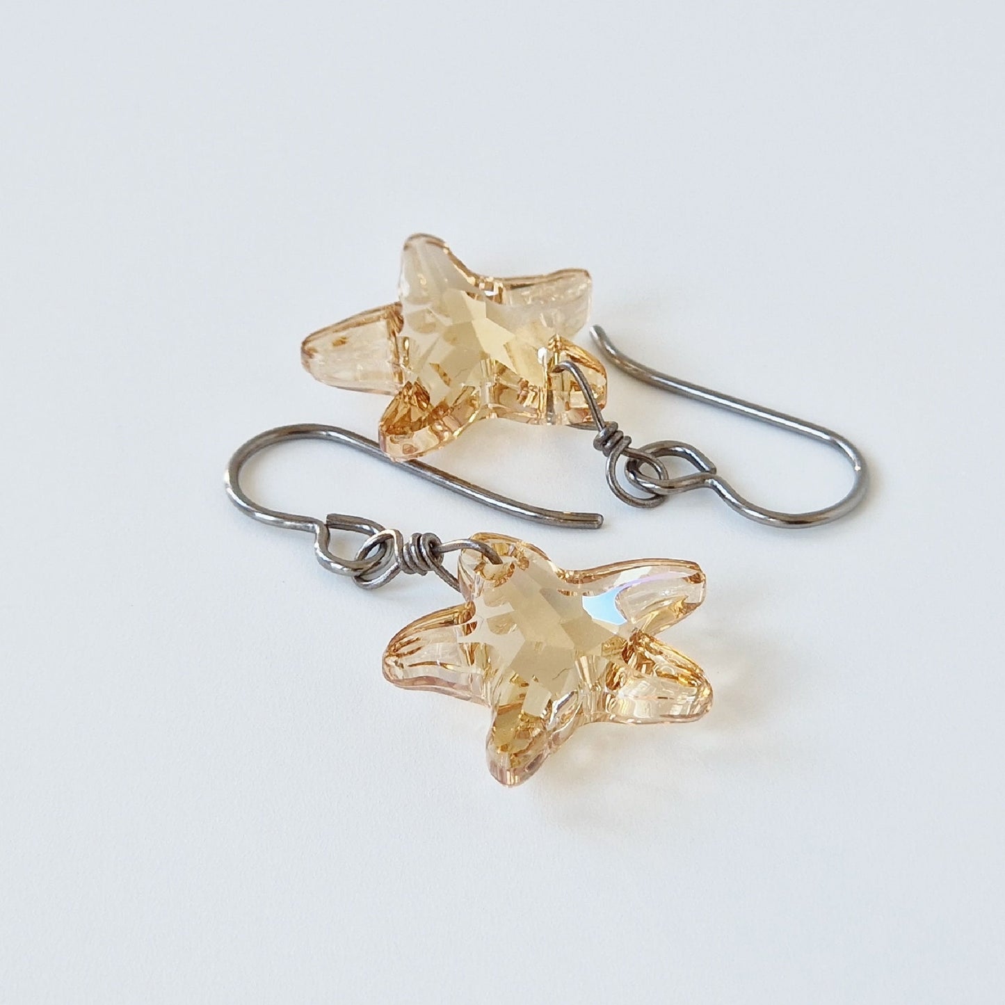 Golden Shadow Crystal Starfish Titanium Earrings