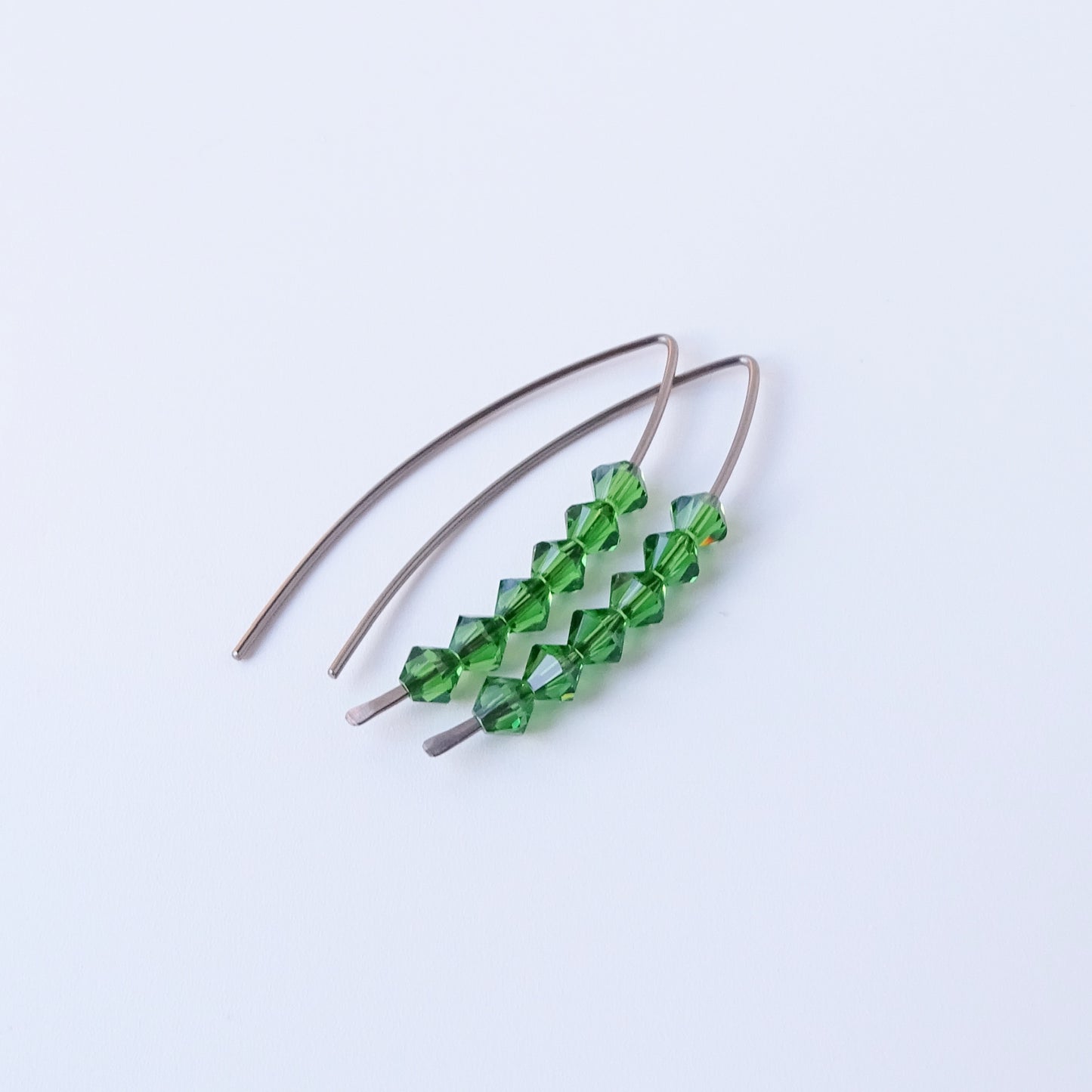 Niobium Earrings with Fern Green Crystals