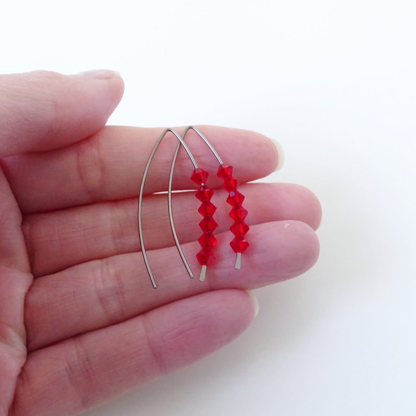 Niobium Earrings with Red Crystals