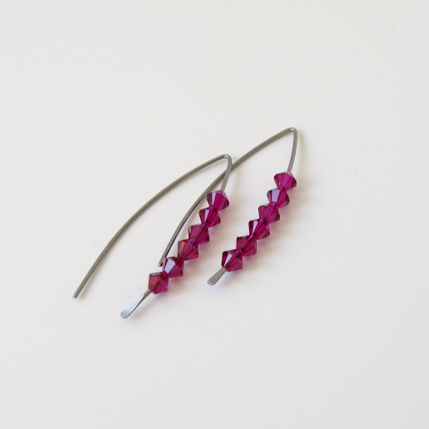 Niobium Earrings with Ruby Crystals