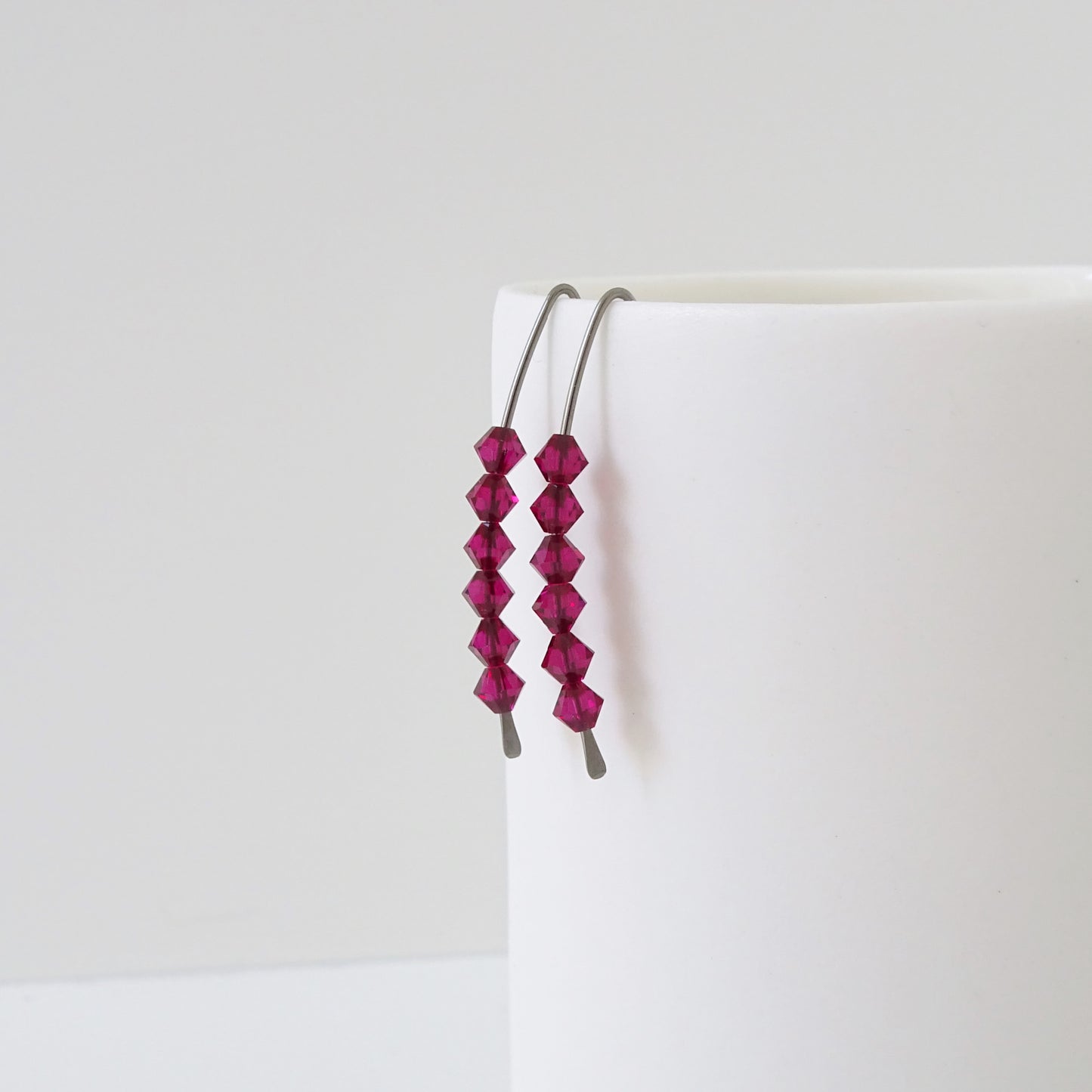 Niobium Earrings with Ruby Crystals
