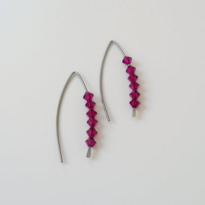 Niobium Earrings with Ruby Crystals