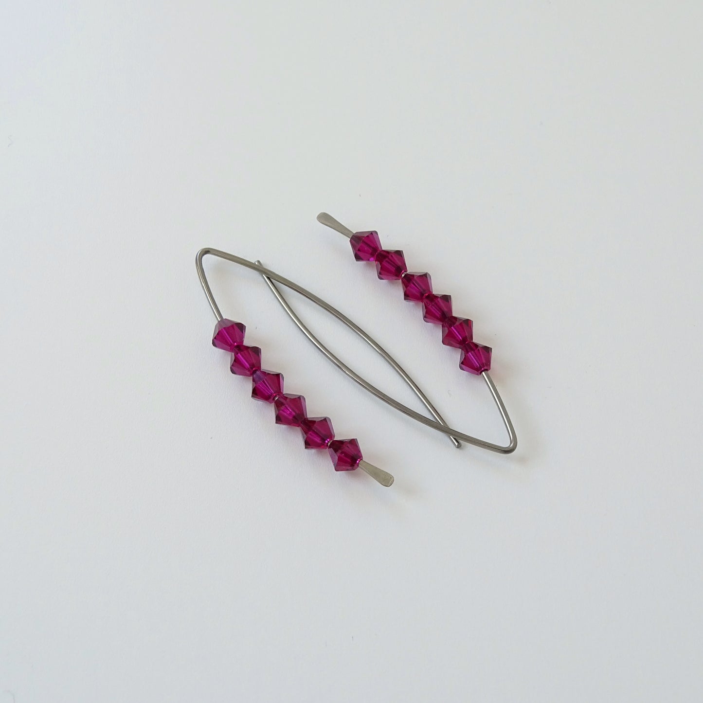 Niobium Earrings with Ruby Crystals